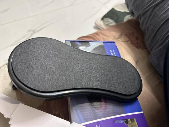Ergonomic desk arm/wrist rest pad designed for comfort and support for PC and office users.